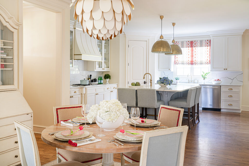 kitchen remodel with white cabinets, quartz countertop and brass hardware