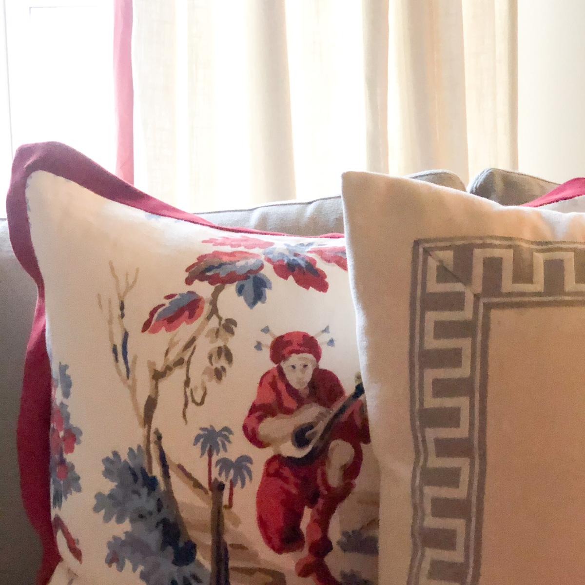 Contemporary chinoises fabric design on pillow. Greek key on pillow