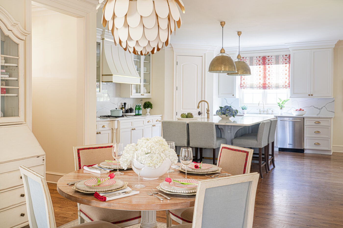 kitchen and breakfast nook with several wood finishes