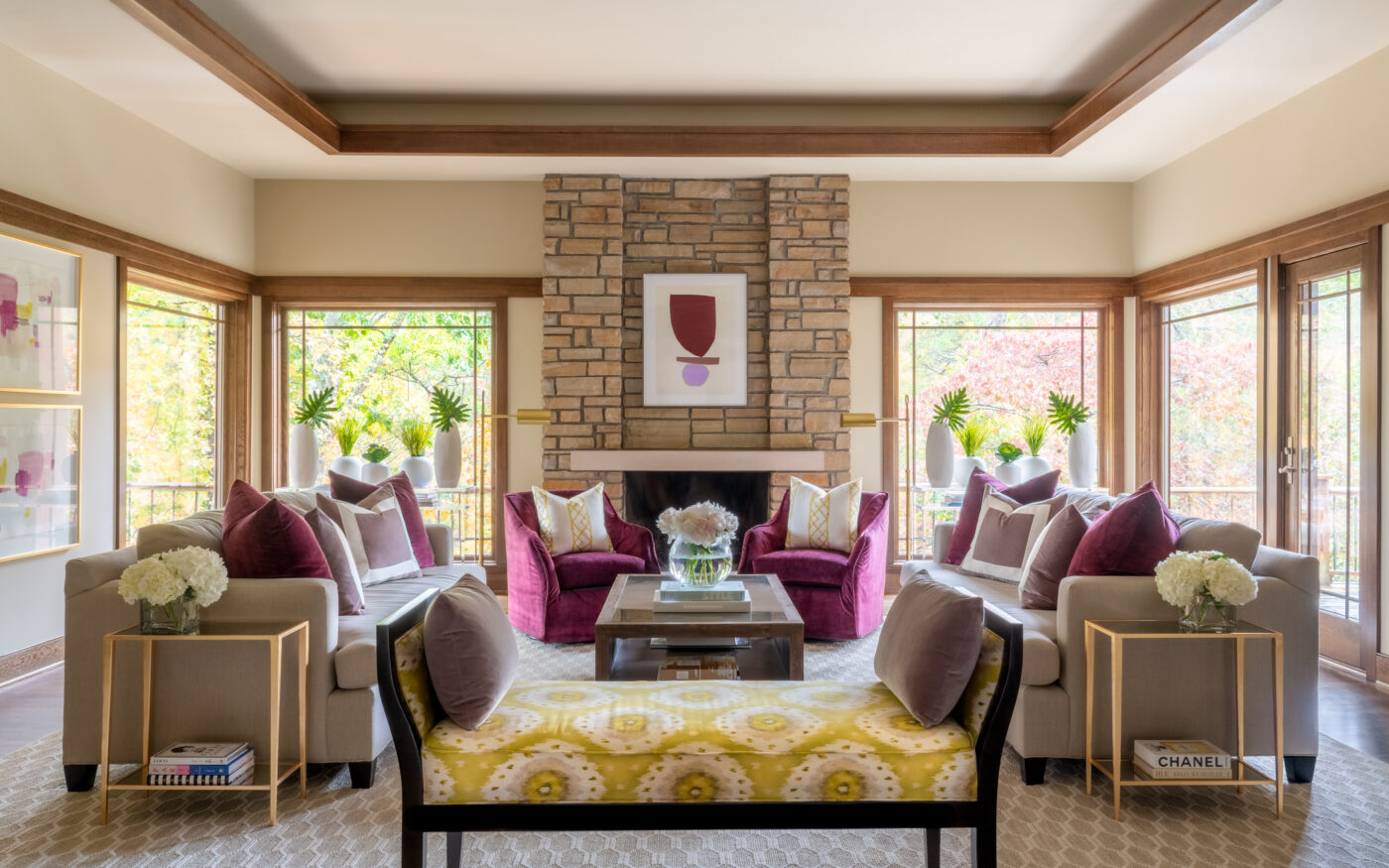 living room with stone fireplace